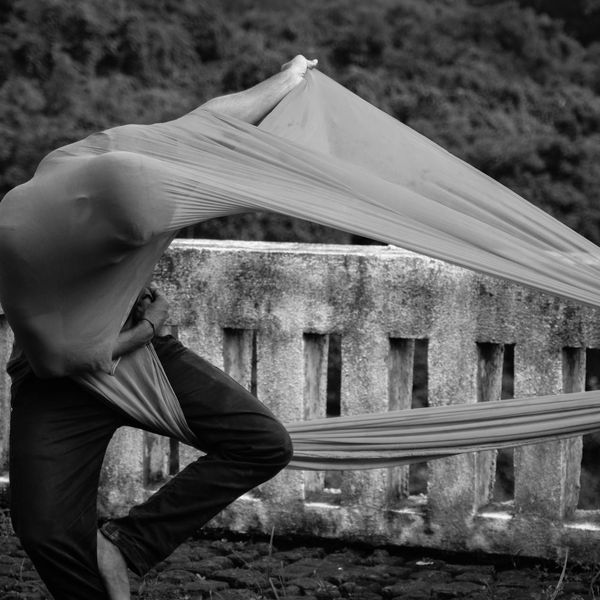 Stylized silhouette of a person showing energy flow lines.